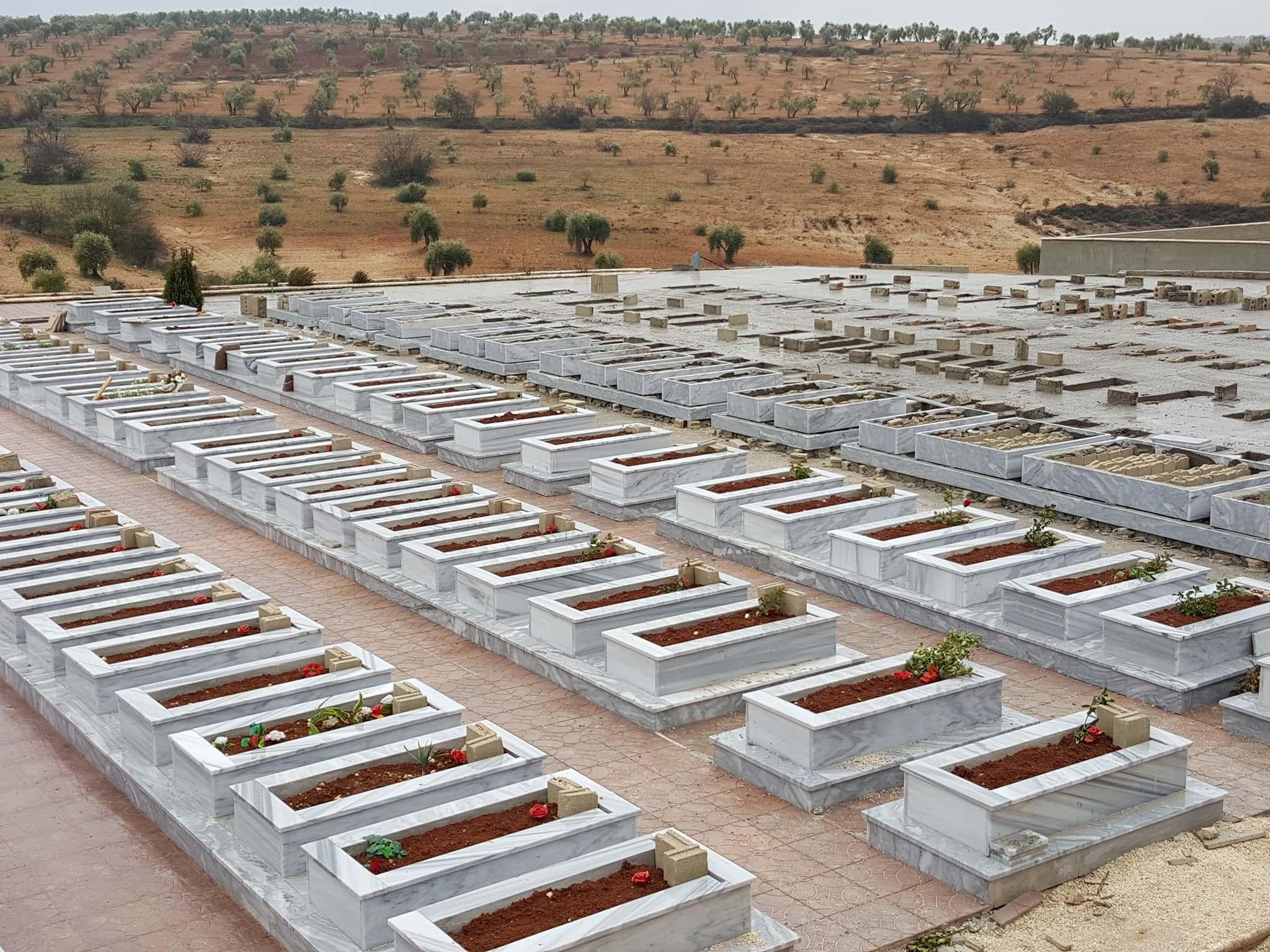 The Kurdish ‘martyrs’ cemetery outside Afrin. Many of the dead in the marble graves were killed fighting Isis during the Syrian war