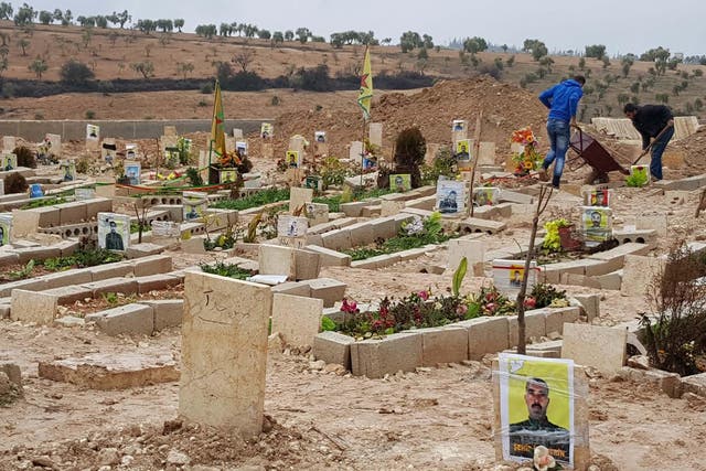 Fresh graves for the Kurds of Afrin. The digging machines are preparing for the bodies of eight Kurdish militiamen and civilians killed by Turkish fire in the Syrian province last week
