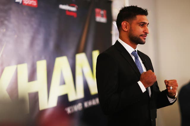 Khan will fight on April 21