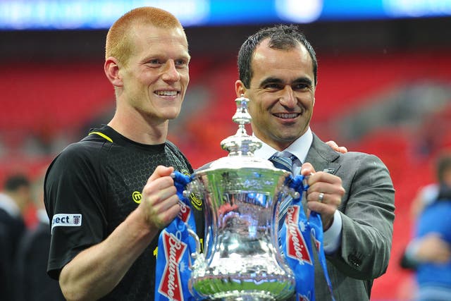 Ben Watson and Roberto Martinez celebrate Wigan's victory over Man City in the 2013 FA Cup final