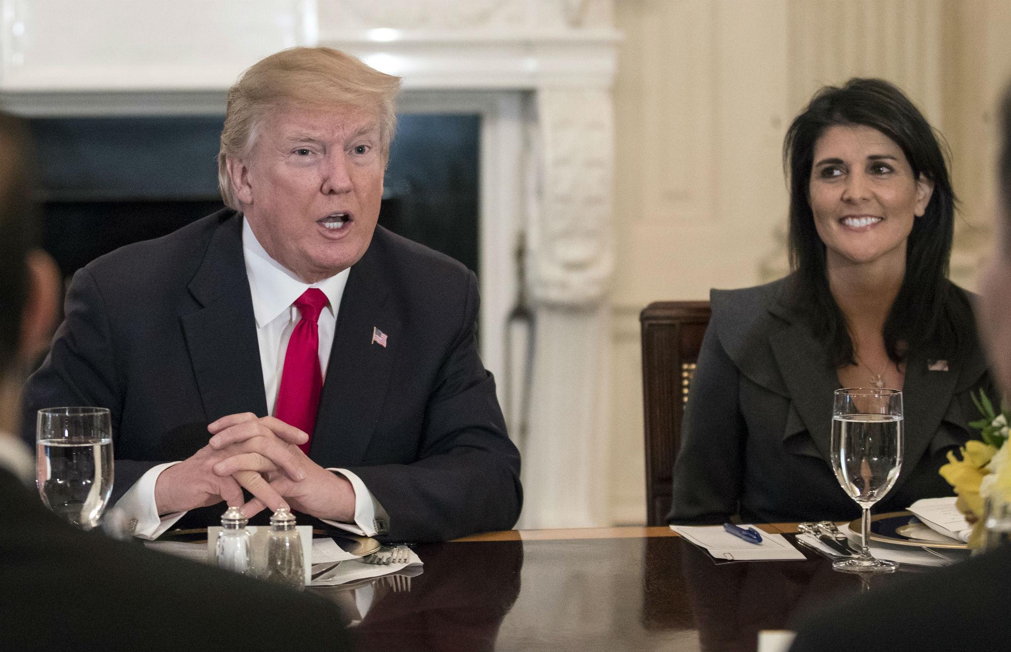During a meeting with members of the UN Security Council, President Donald Trump said his administration would no longer engage in talks with the Taliban. He is sitting next to Nikki Haley, the US's ambassador to the UN