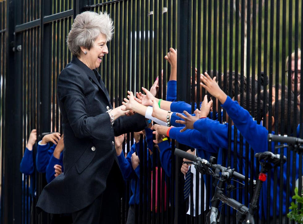 The Prime Minister at a London school last year: she also trumpeted an expansion of bilateral teaching and language programmes