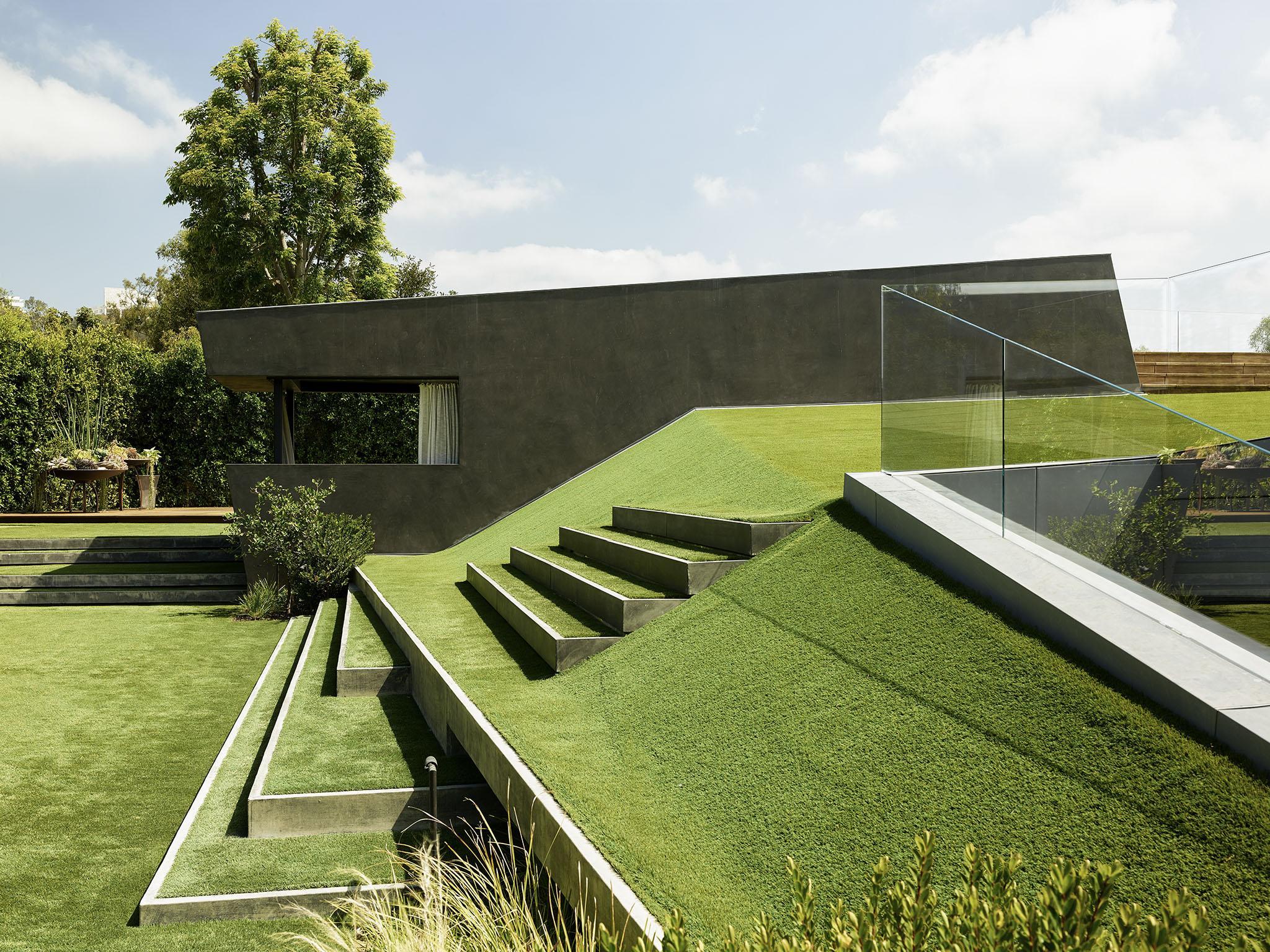 The green, green grass of home: the property was designed to maximise indoor/outdoor living