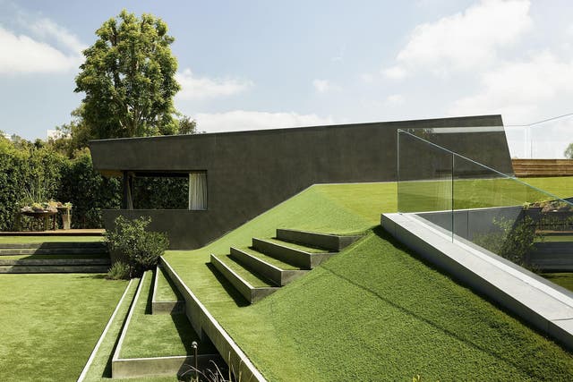 The green, green grass of home: the property was designed to maximise indoor/outdoor living
