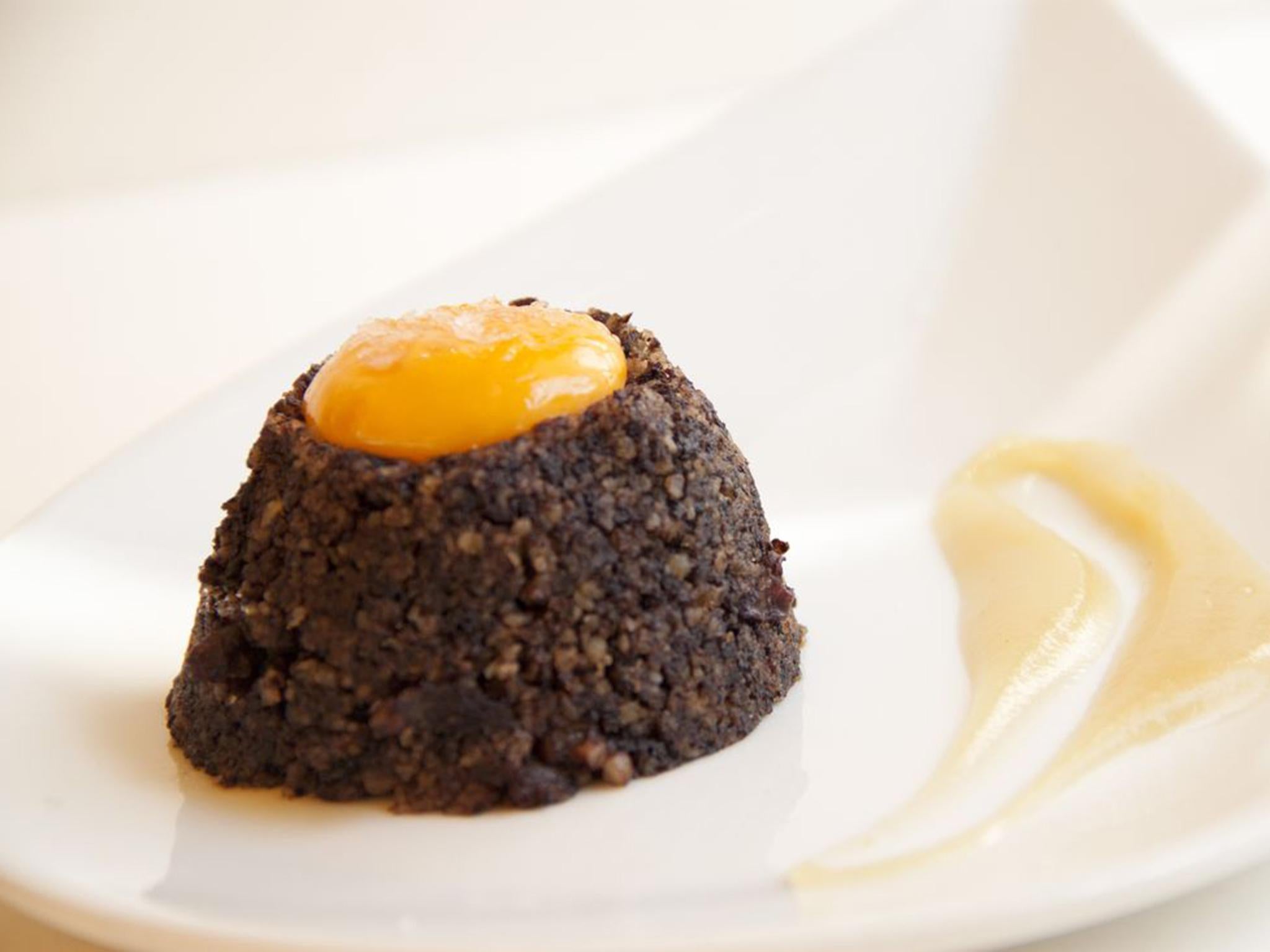 Eruption of taste: Hidalgo 56’s volcano of black pudding with egg yolk, grapes and apple