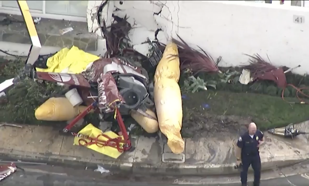 Helicopter crashes into house killing three in California The