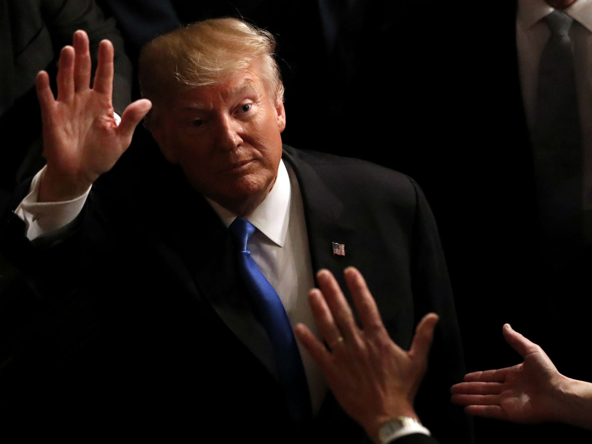 Donald Trump departs after delivering his State of the Union address to a joint session of Congress