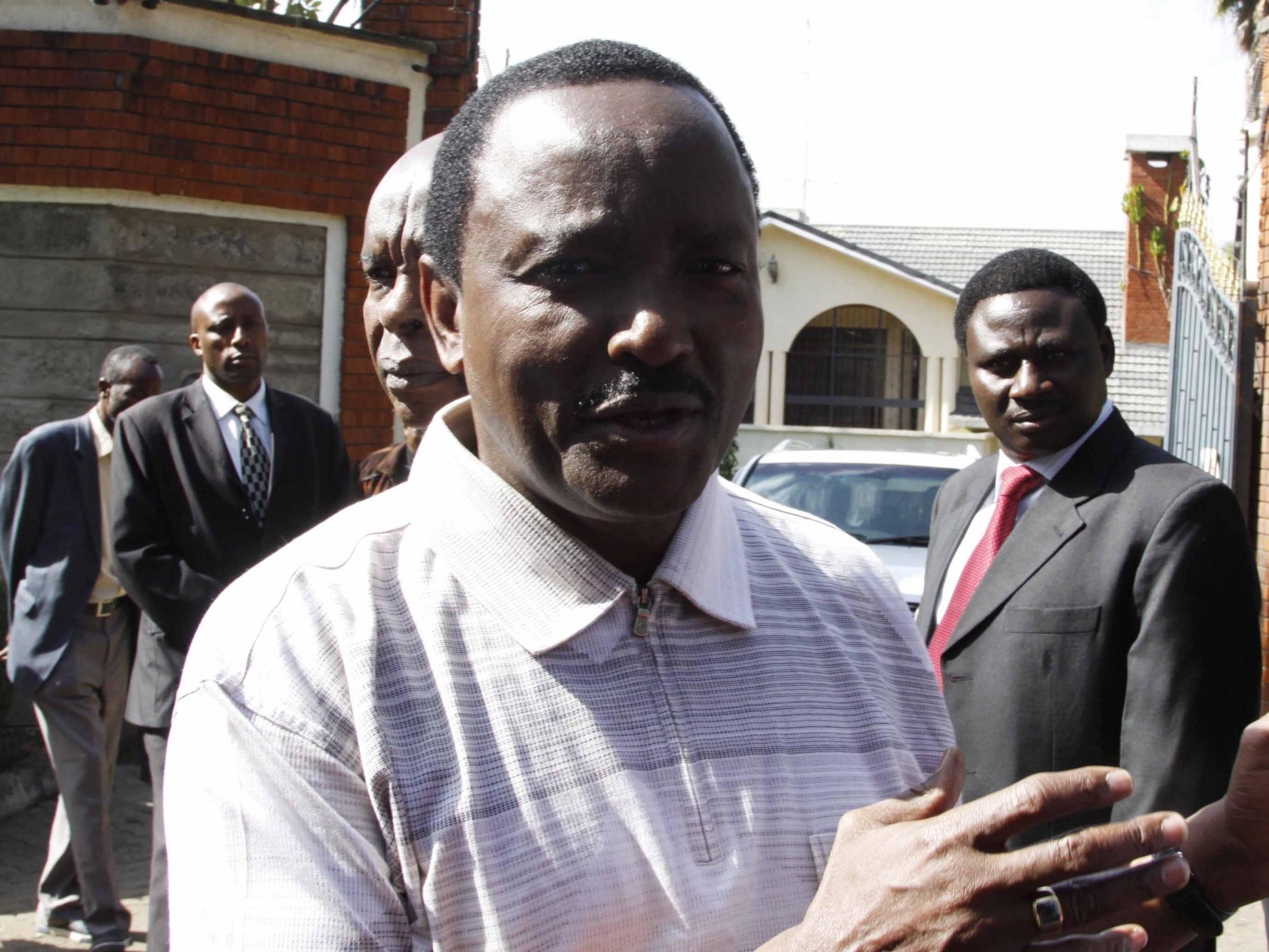 Former Kenyan Vice President Kalonzo Musyoka talks to members of the media outside his home in Nairobi after reporting that an ‘assassination attempt’ was made against him