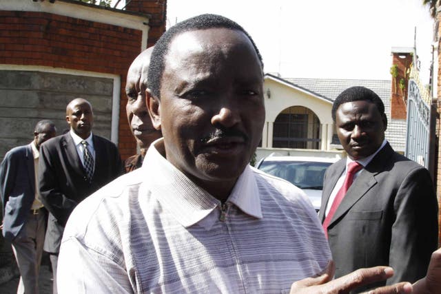 Former Kenyan Vice President Kalonzo Musyoka talks to members of the media outside his home in Nairobi after reporting that an ‘assassination attempt’ was made against him