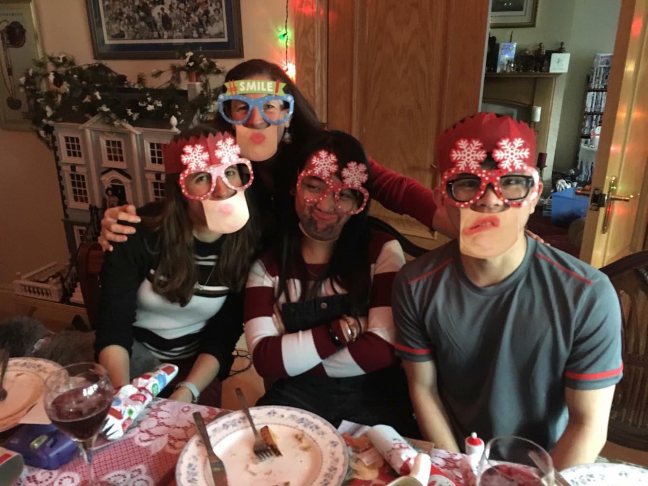 Stephen (far right) celebrates Christmas with (from left) foster sister Naomi, foster mother Davina and his girlfriend