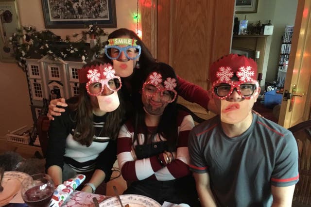 Stephen (far right) celebrates Christmas with (from left) foster sister Naomi, foster mother Davina and his girlfriend