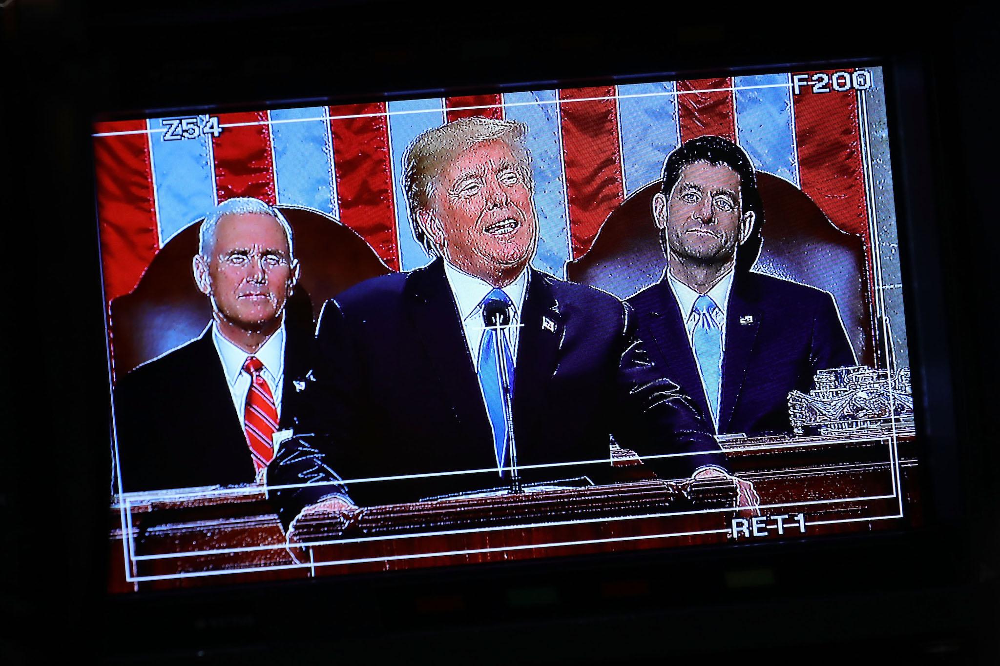 U.S. President Donald J. Trump appears on a television camera monitor as he delivers the State of the Union address