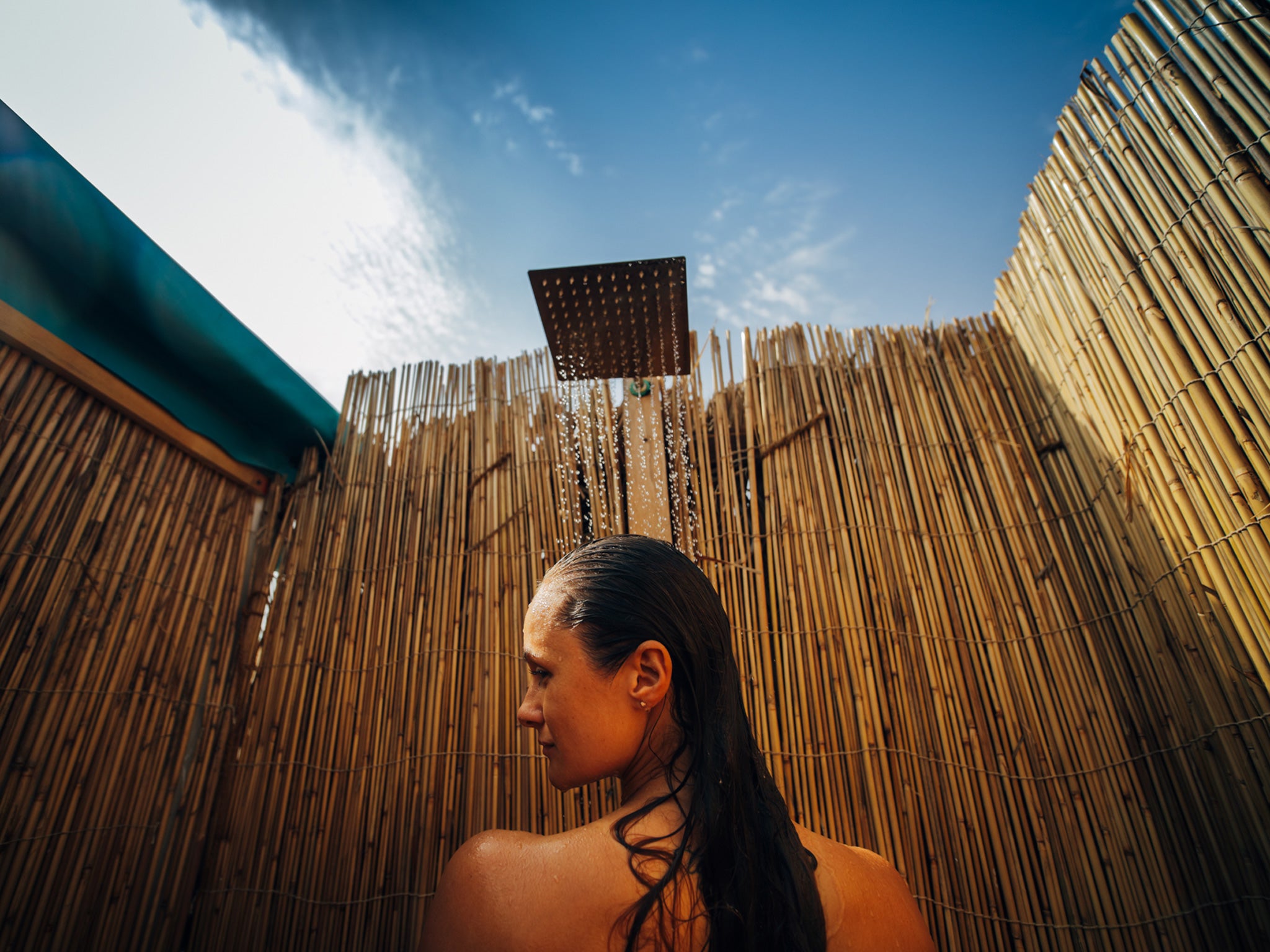 The open-air shower in one of the cabins’ en-suite bathroom