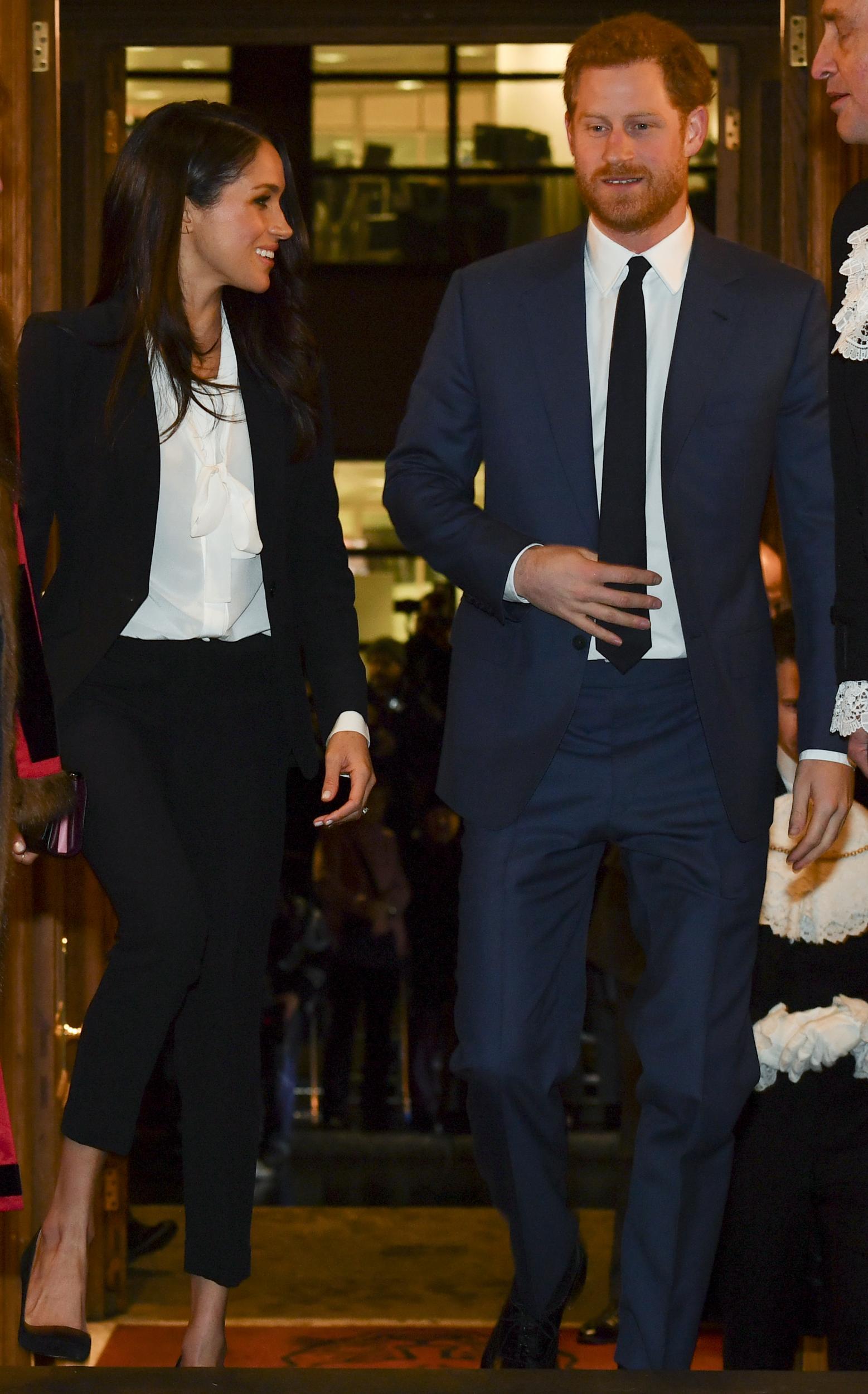 Markle wore a suit designed by Alexander McQueen