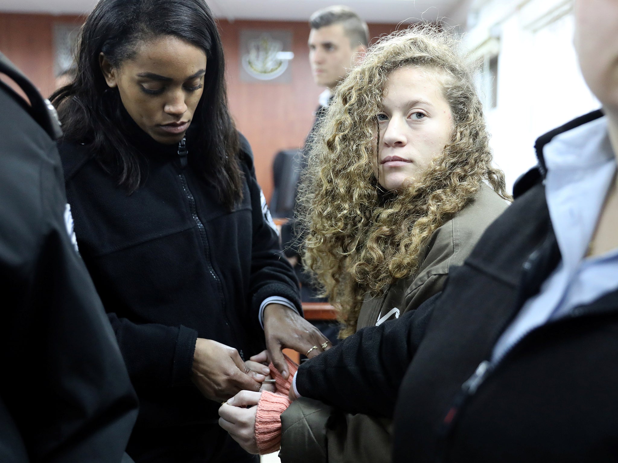Ahed Tamimi enters a military courtroom last month (Reuters)