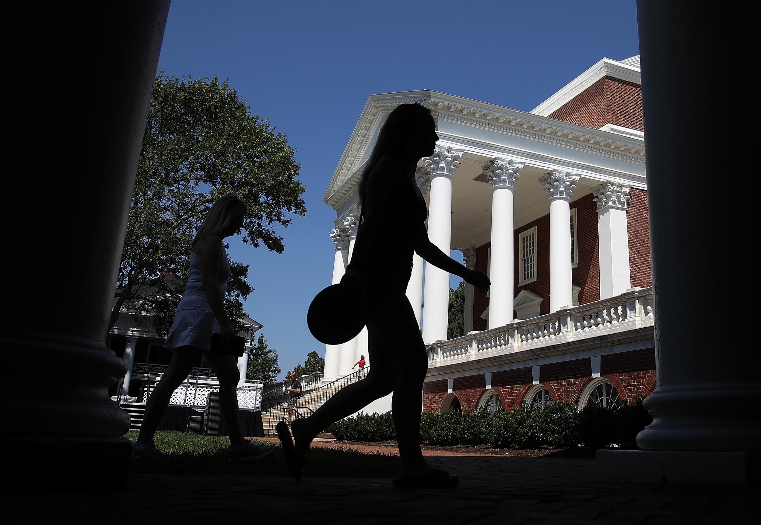 Students return to the University of Virginia after a white supremacist rally was held on campus over the summer