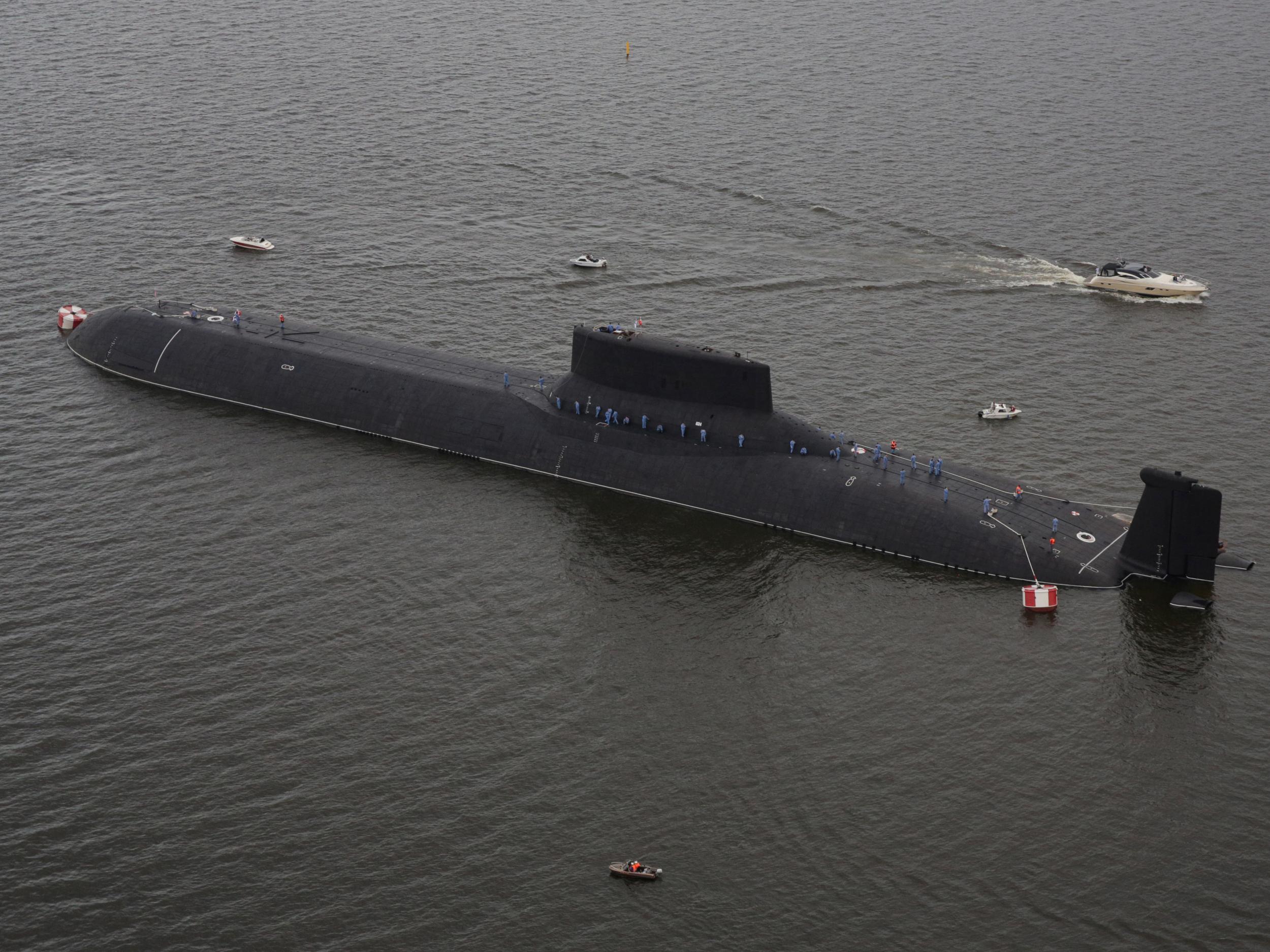 An aerial view shows the Russian nuclear submarine Dmitry Donskoy moored on the eve of the the Navy Day parade in Kronshtadt, a seaport town in the suburb of St. Petersburg, Russia