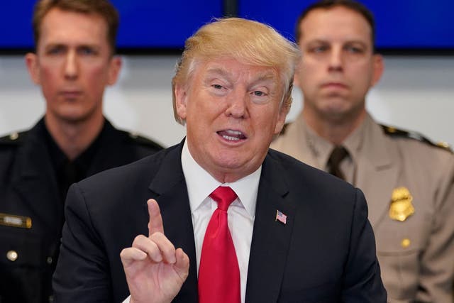 Donald Trump speaks during a meeting at the Customs and Border Protection National Targeting Center