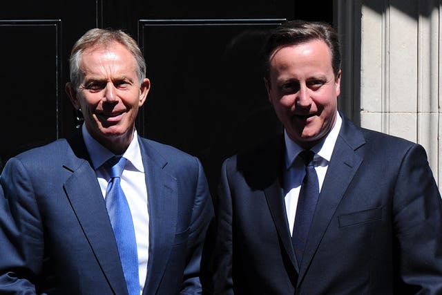 Tony Blair (L) and David Cameron (R) outside 10 Downing Street