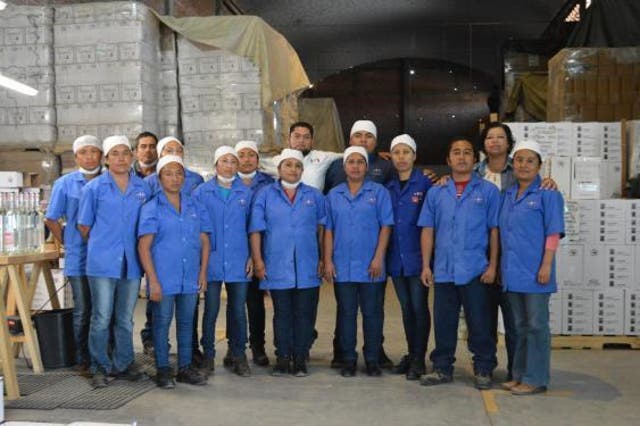 Some of the staff at Los Danzantes' bottling plant