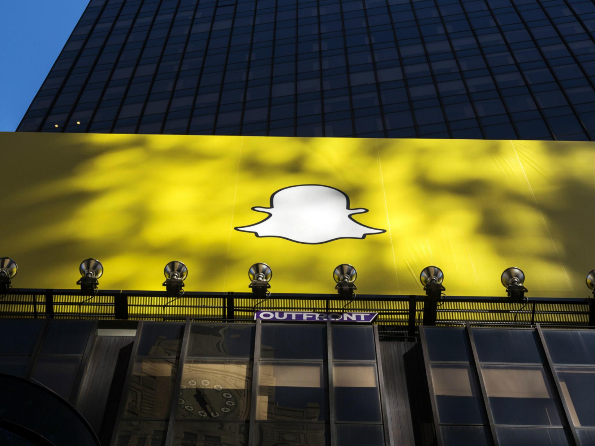 A billboard displays the logo of Snapchat above Times Square in New York March 12, 2015