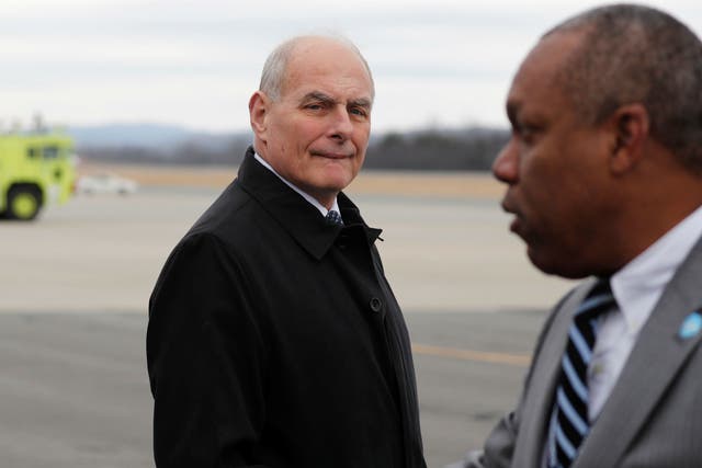 White House Chief of Staff John Kelly arrives with US President Donald Trump en route to address a Republican congressional retreat in Lewisburg, West Virginia