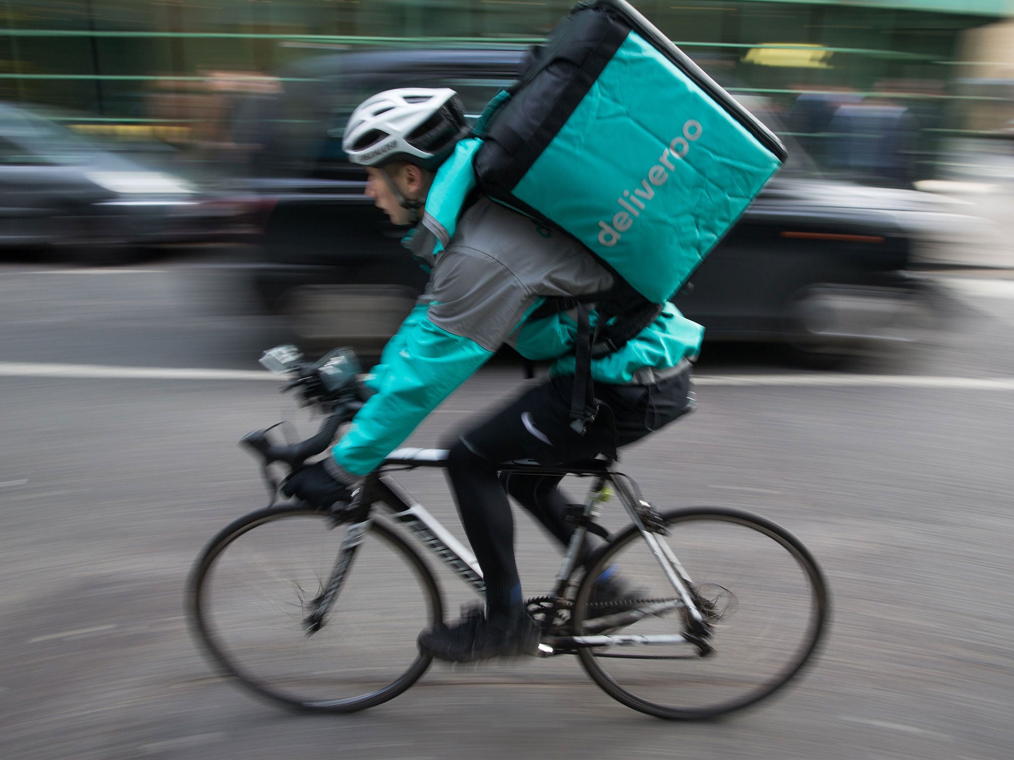 Restaurant Food Delivery company 'Deliveroo' employee in Camden, north London