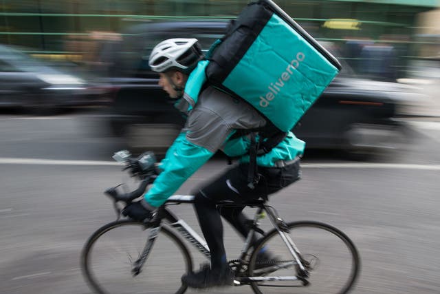 Restaurant Food Delivery company 'Deliveroo' employee in Camden, north London