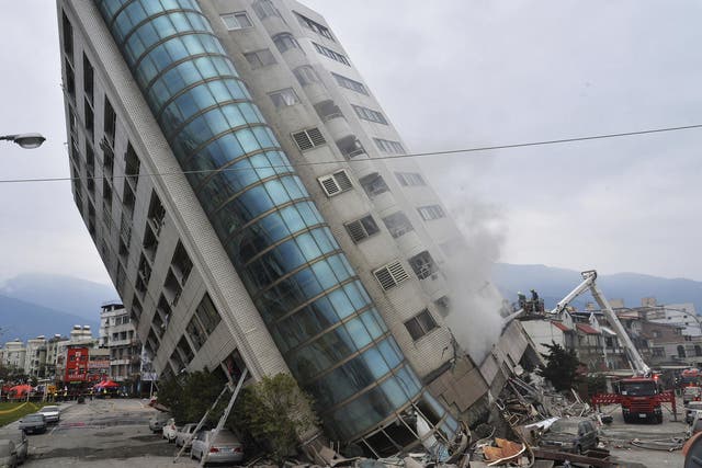 Residential building leans on a collapsed first floor in Taiwan