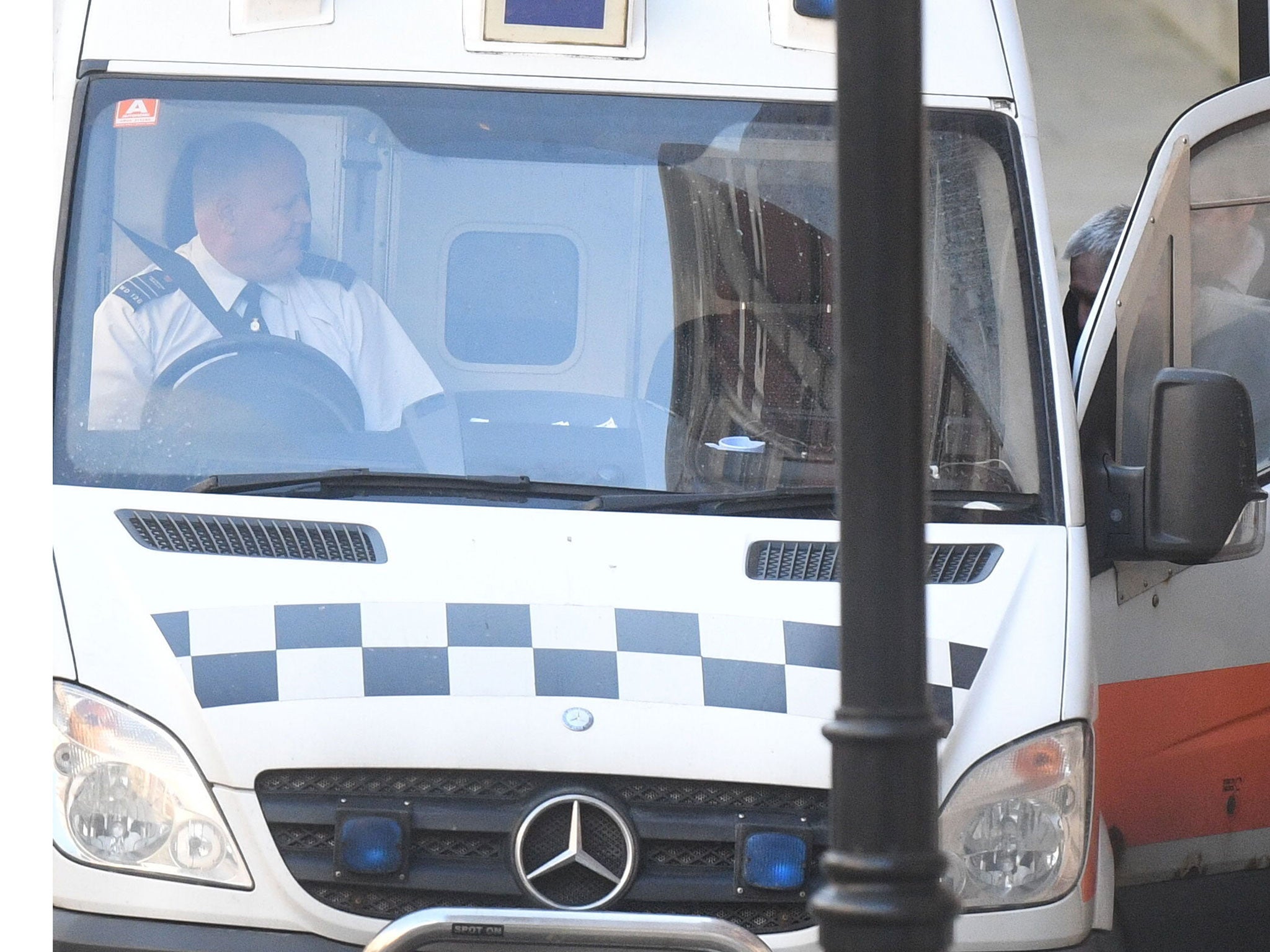 Black cab rapist John Worboys, is led into a prison van following an appearance at the High Court in London