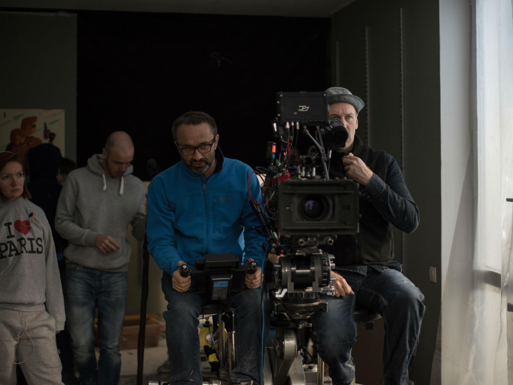 Zvyagintsev behind the scenes (in blue) while filming his feature film ‘Loveless’ (Courtesy of Altitude Films)