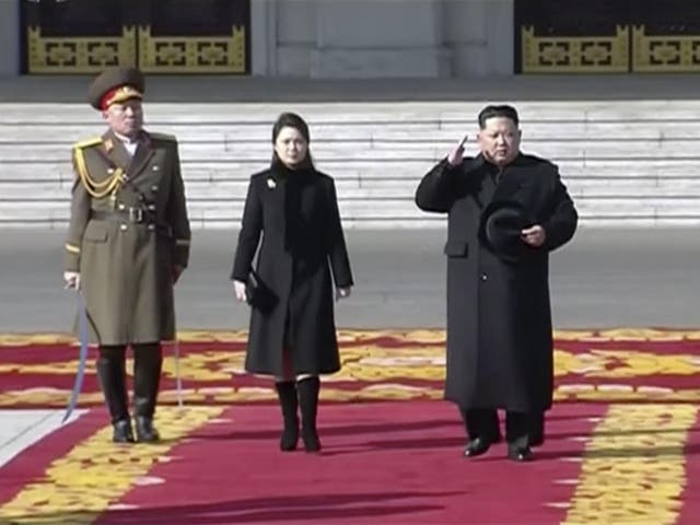Kim Jong-un inspects a military parade on the eve of the Winter Olympics