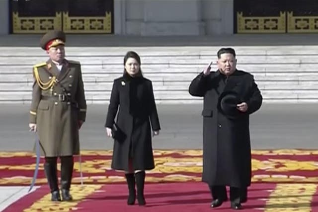 Kim Jong-un inspects a military parade on the eve of the Winter Olympics