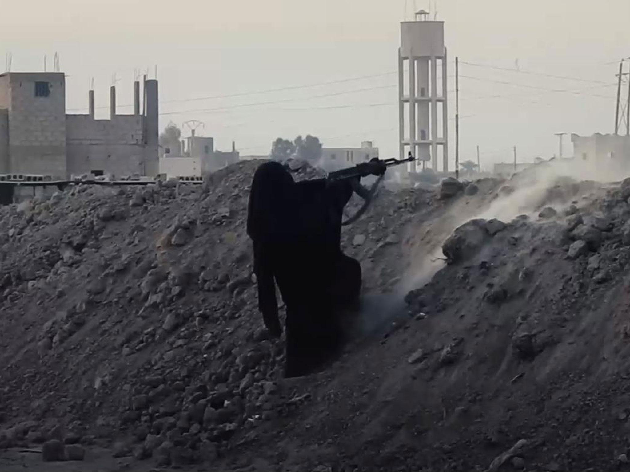 A female Isis fighter featured in a propaganda video released on 7 February