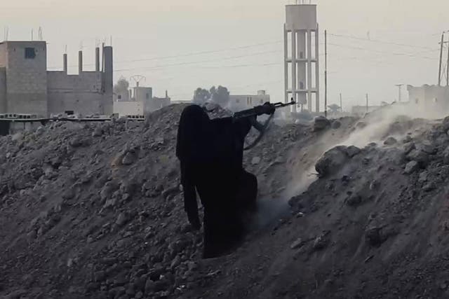 A female Isis fighter featured in a propaganda video released on 7 February 2018