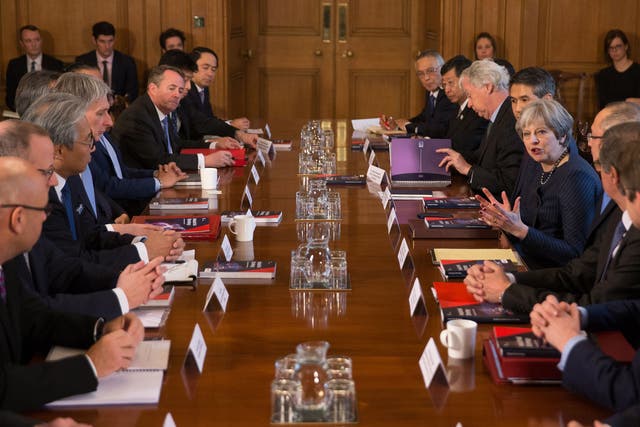 Prime Minister Theresa May speaks as she hosts a roundtable with Japanese investors at 10 Downing Street.