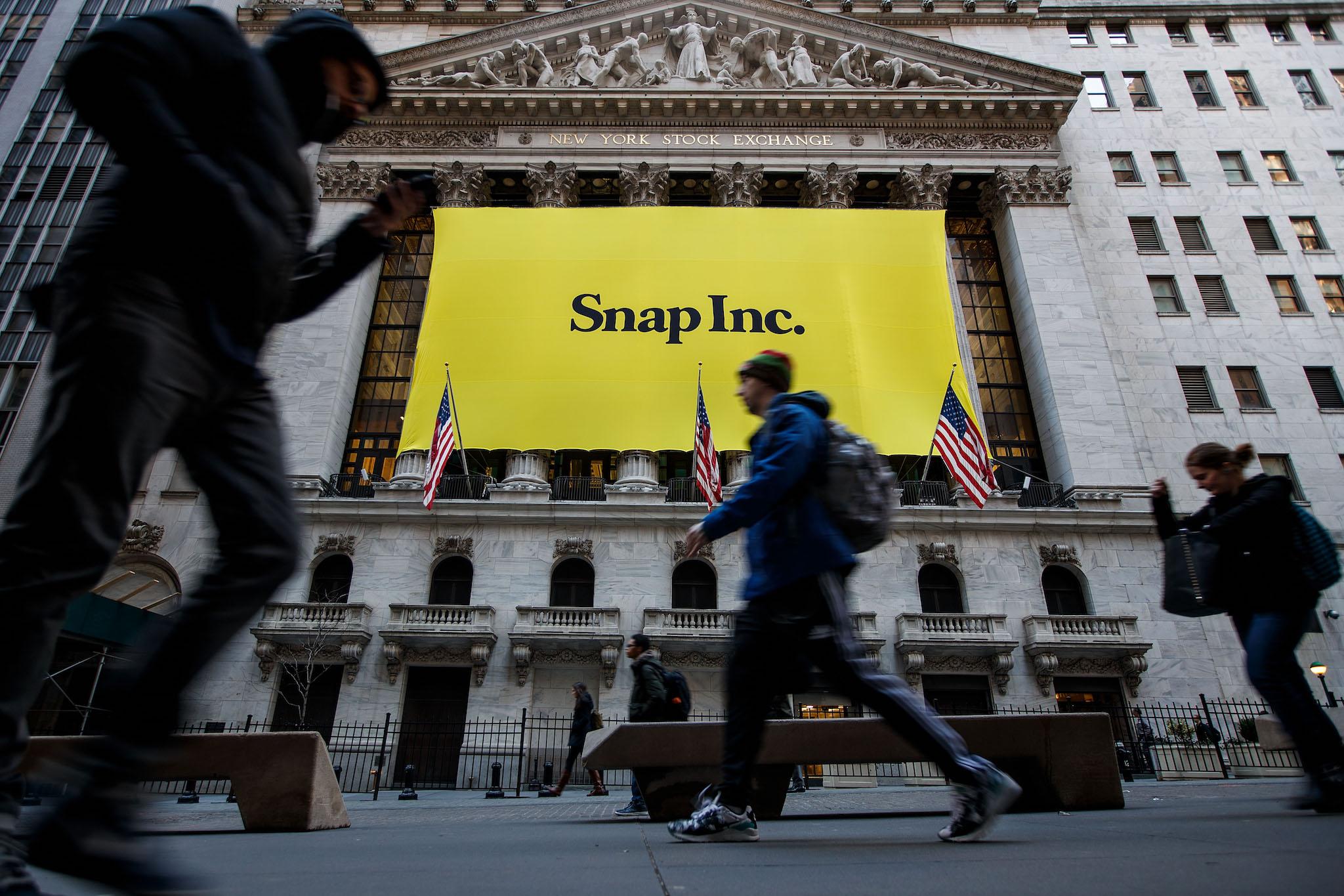 Signage for Snap Inc., parent company of Snapchat, adorns the front of the New York Stock Exchange