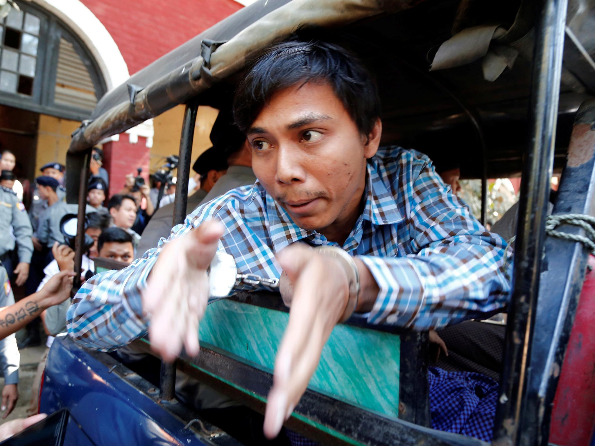 Journalists Wa Lone (top) and Kyaw Soe Oo are being detained in Yangon. They were arrested for their investigations into the killings