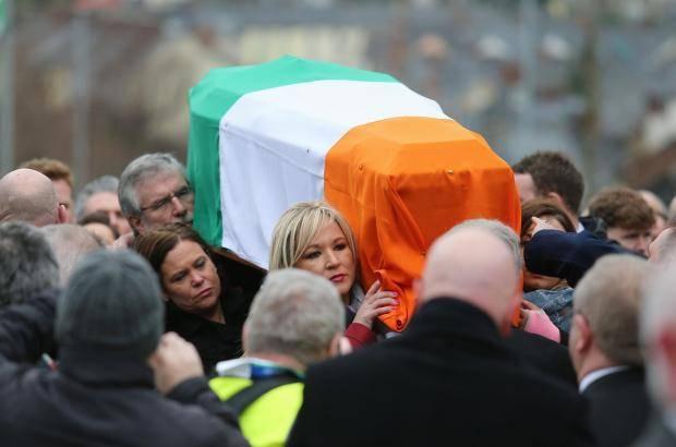 Mary Lou McDonald, Michelle O’Neill and Gerry Adams carry the coffin of Martin McGuinness