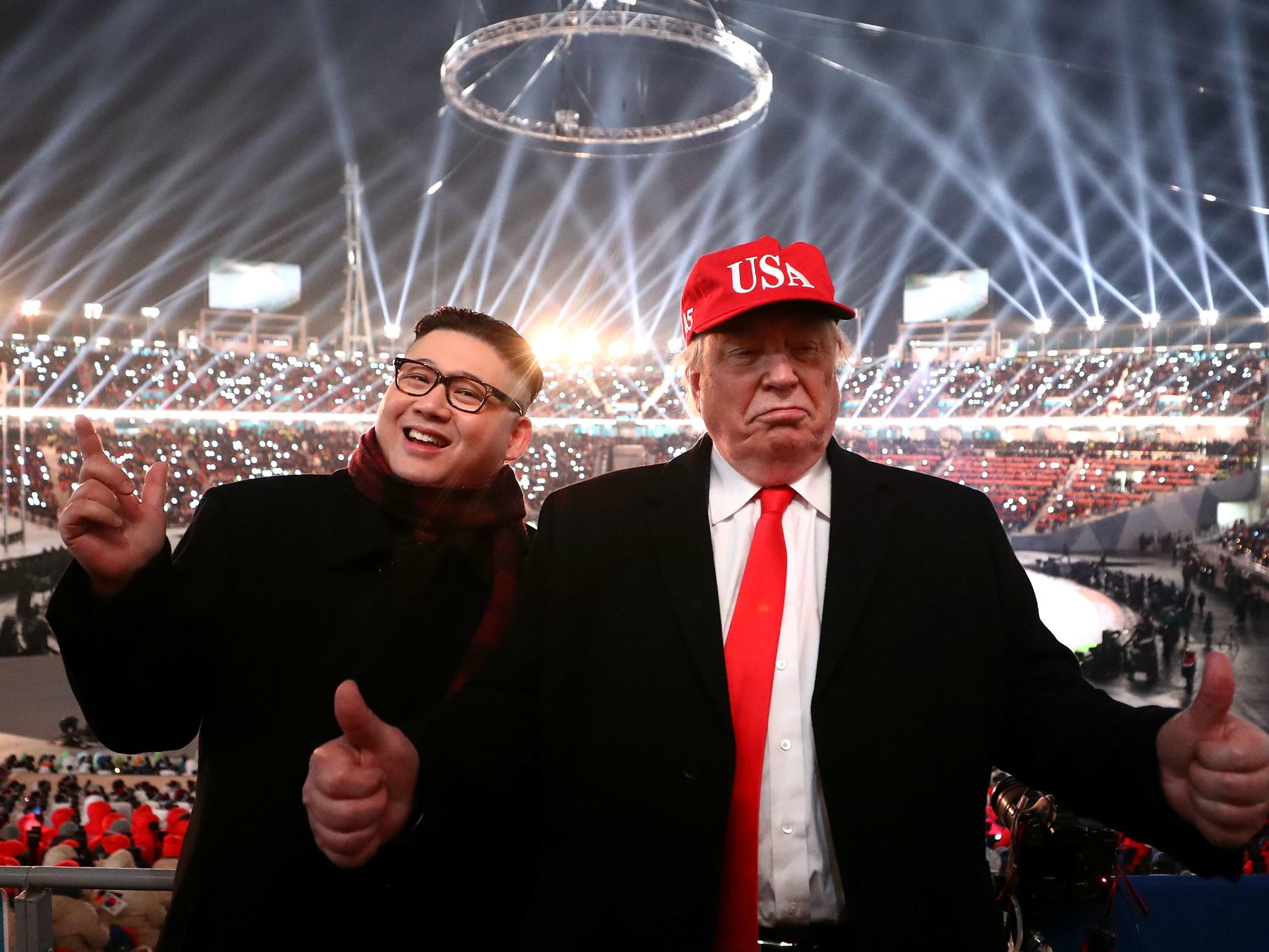 Impersonators of Donald Trump and Kim Jong Un pose during the Opening Ceremony of the PyeongChang 2018 Winter Olympic Games on 9 February 2018