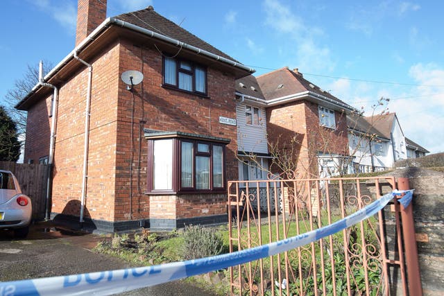 The house remains cordoned off to allow forensic experts to conduct an examination