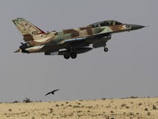 Israel says Iran is ‘playing with fire’ as it strikes forces in Syria
