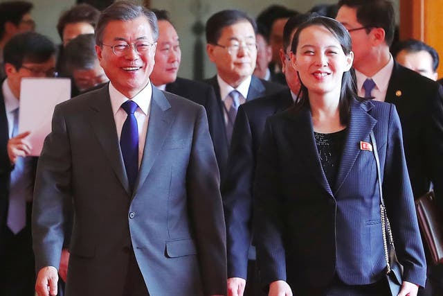 South Korea's President Moon Jae-in with the North Korean leader’s sister Kim Yo-jong, who extended the invitation, in Seoul yesterday