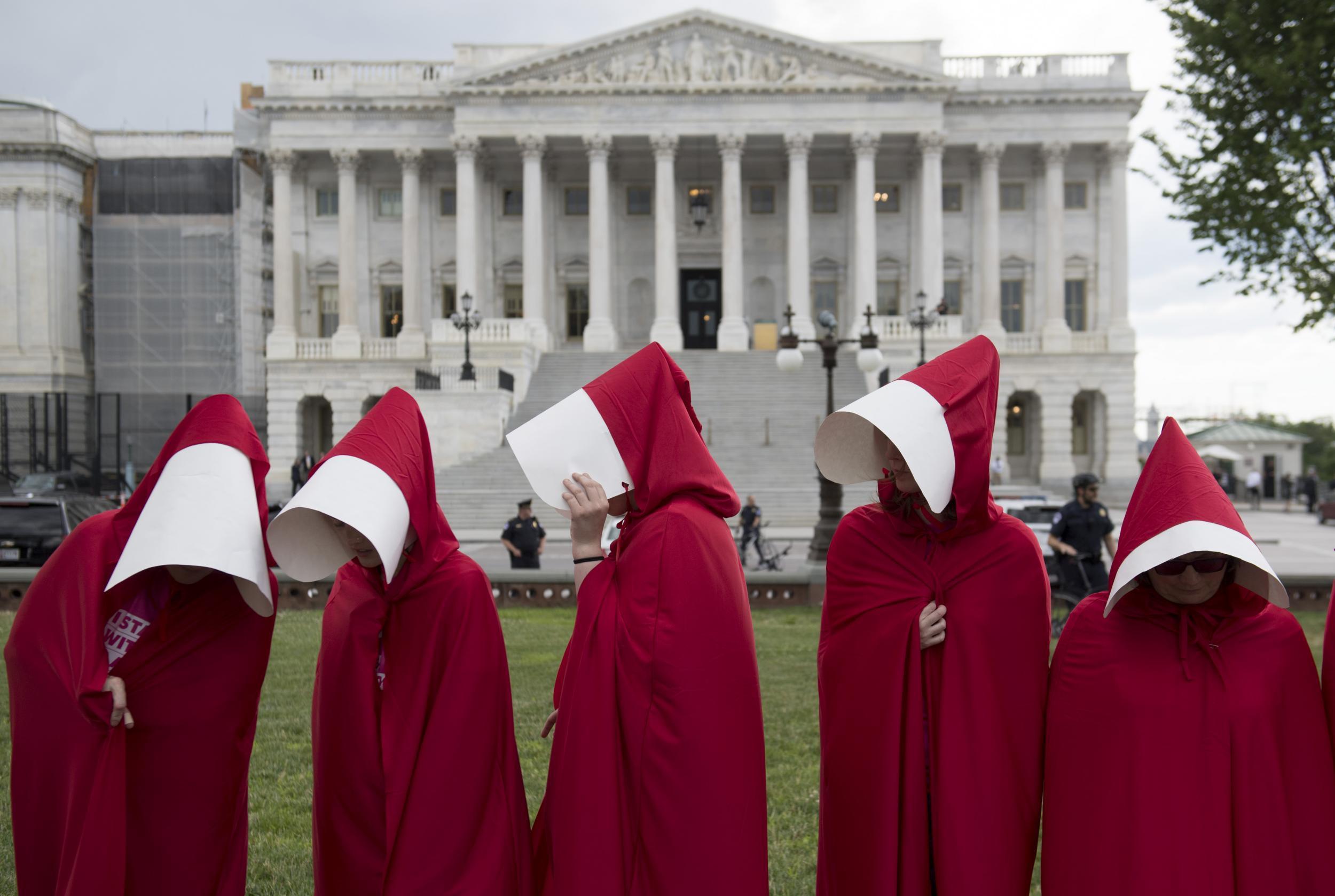 Women dress as characters from ‘The Handmaid's Tale’ protest anti-abortion legislation in the US