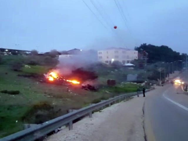 The Israeli military said two of its pilots have been injured after one of their F-16 jets crashed after coming under heavy fire
