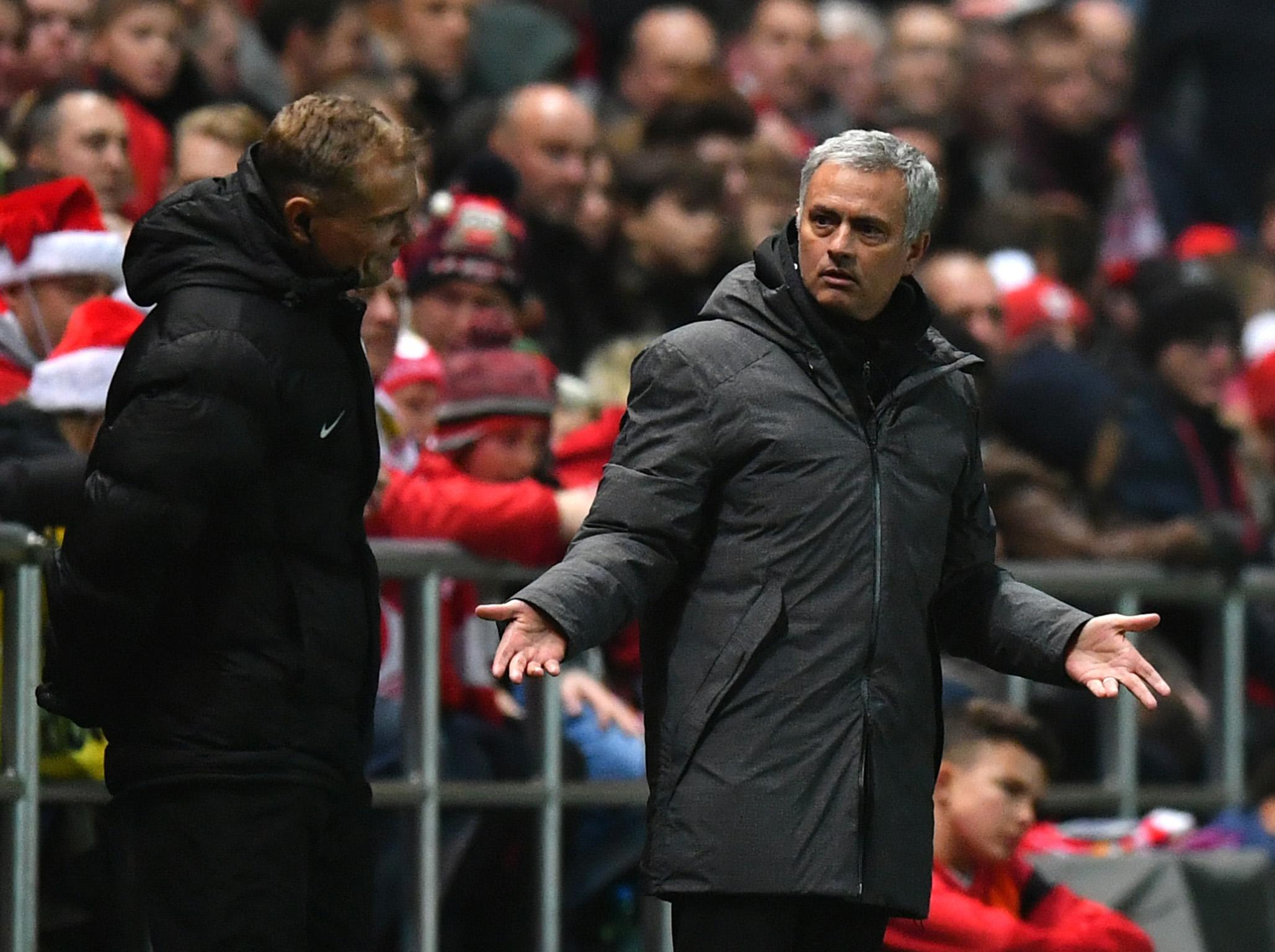 Jose Mourinho says he is trying to be on his best behaviour