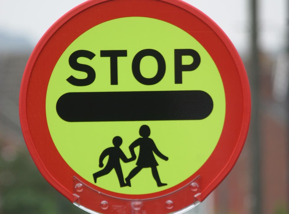 Councils have been cracking down on high fives from crossing guards claiming they could be a distraction