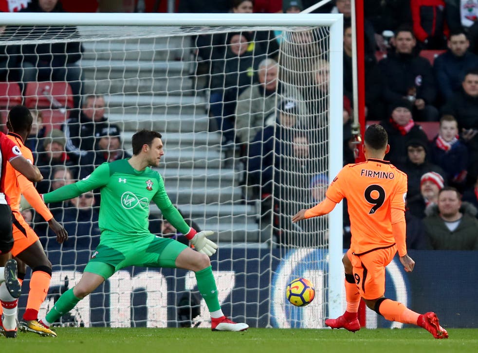 Roberto Firmino scores past Southampton goalkeeper Alex McCarthy