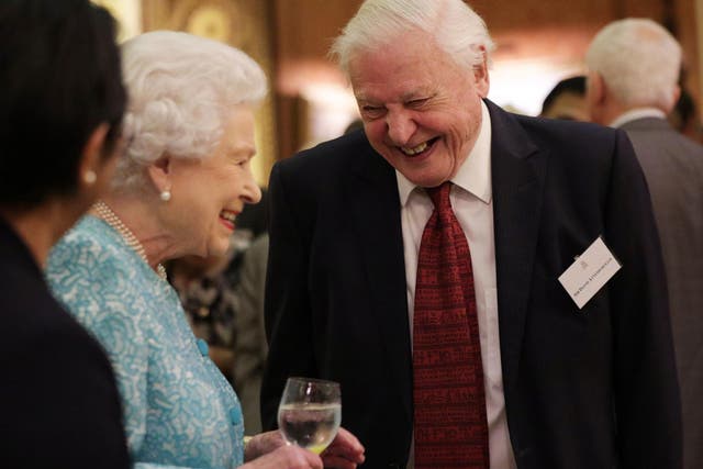 Queen Elizabeth II and Sir David Attenborough at a reception to showcase forestry projects that have been dedicated to the new conservation initiative The Queen's Commonwealth Canopy at Buckingham Palace in November 2016