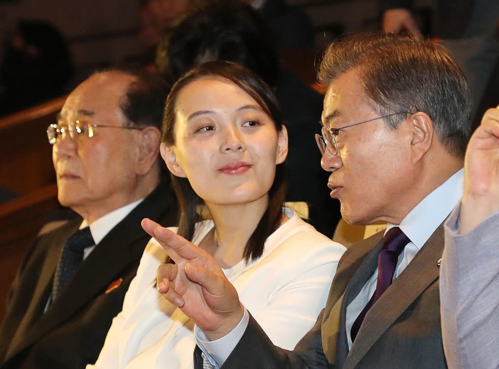 South Korean President Moon Jae-in, right, talks with North Korean leader Kim Jong-un's sister Kim Yo-jong as they watch a concert of Pyongyang's Samjiyon Orchestra at a national theatre in Seoul